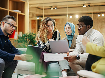 Group of coworkers around table