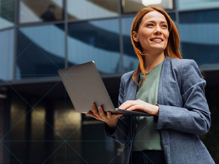 business woman holding a laptop