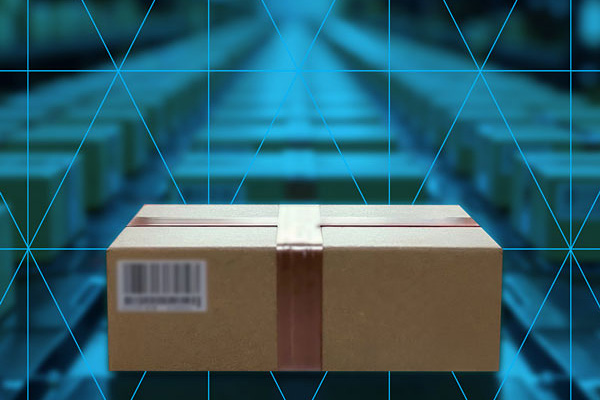 Cardboard boxes on a conveyor belt in a factory