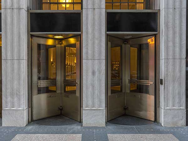 building entrance with revolving doors