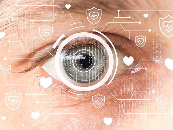 Close-up of an eye surrounded by heart rate icons representing technology and virtual healthcare.