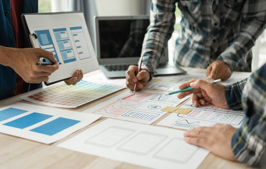 Group of creative team designers working together