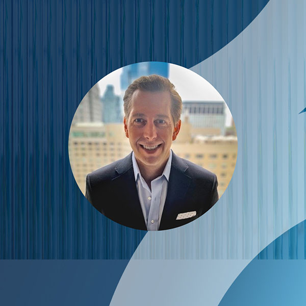 Andy Johnson on a blue background