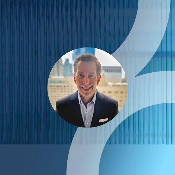 Andy Johnson on a blue background