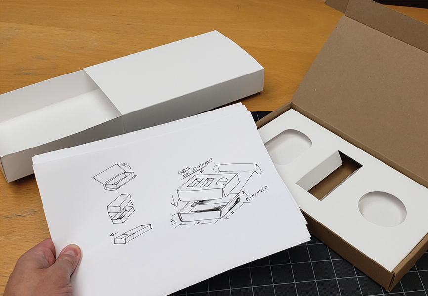 someone sketching packaging designs