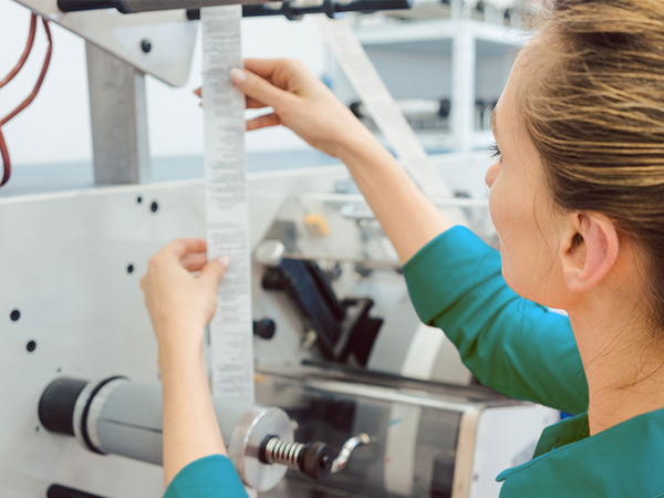 Girl reading a label