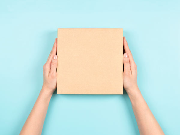 Hands holding a box