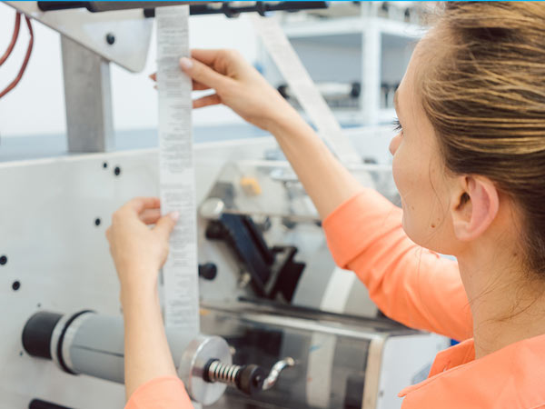 Girl reading a label