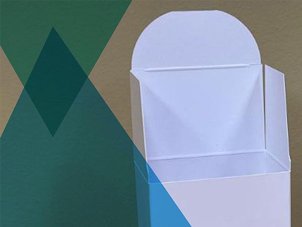 White container with flap closure next to green angular graphic
