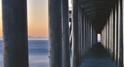 the tunnel stilts under a pier make at low tide