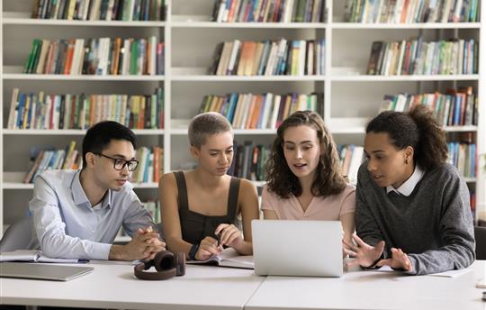 group of students in a library setting