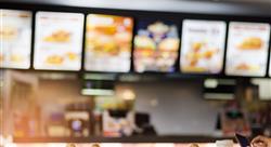 blurry image of a fast food restaurant counter