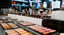 Showcase with powder and shadows, cosmetics store