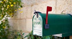 US post mail letter box with red flag