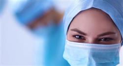 close up of female healthcare worker wearing a blue mask
