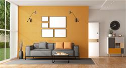 modern living with gray couch in front of yellow wall
