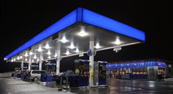 Illuminated Modern Fuel Service Station at night
