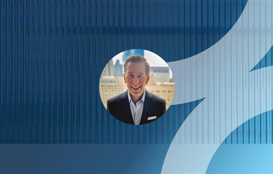 Andy Johnson on a blue background