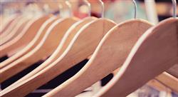 row of wooden clothing hangers